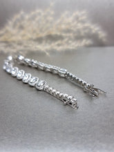 Load image into Gallery viewer, 1.00ct x 3pcs, 0.50ct x 12pcs, 0.10ct x 14pcs Round Brilliant Cut Moissanite Diamond With Halo Side Stone Tennis Bracelet
