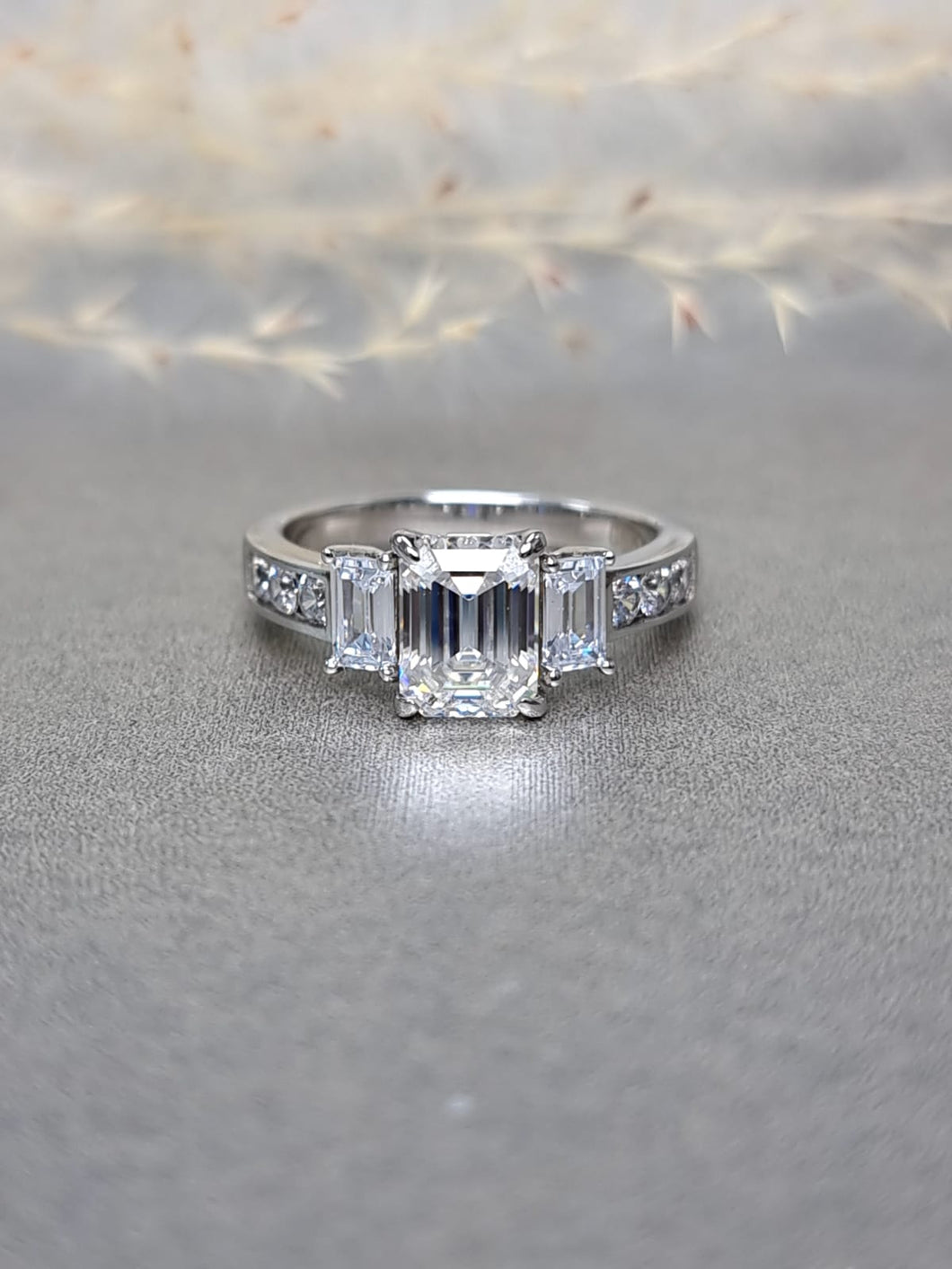 2.00ct Emerald Cut Moissanite Diamond With Baguette Cut Side Stone Ring