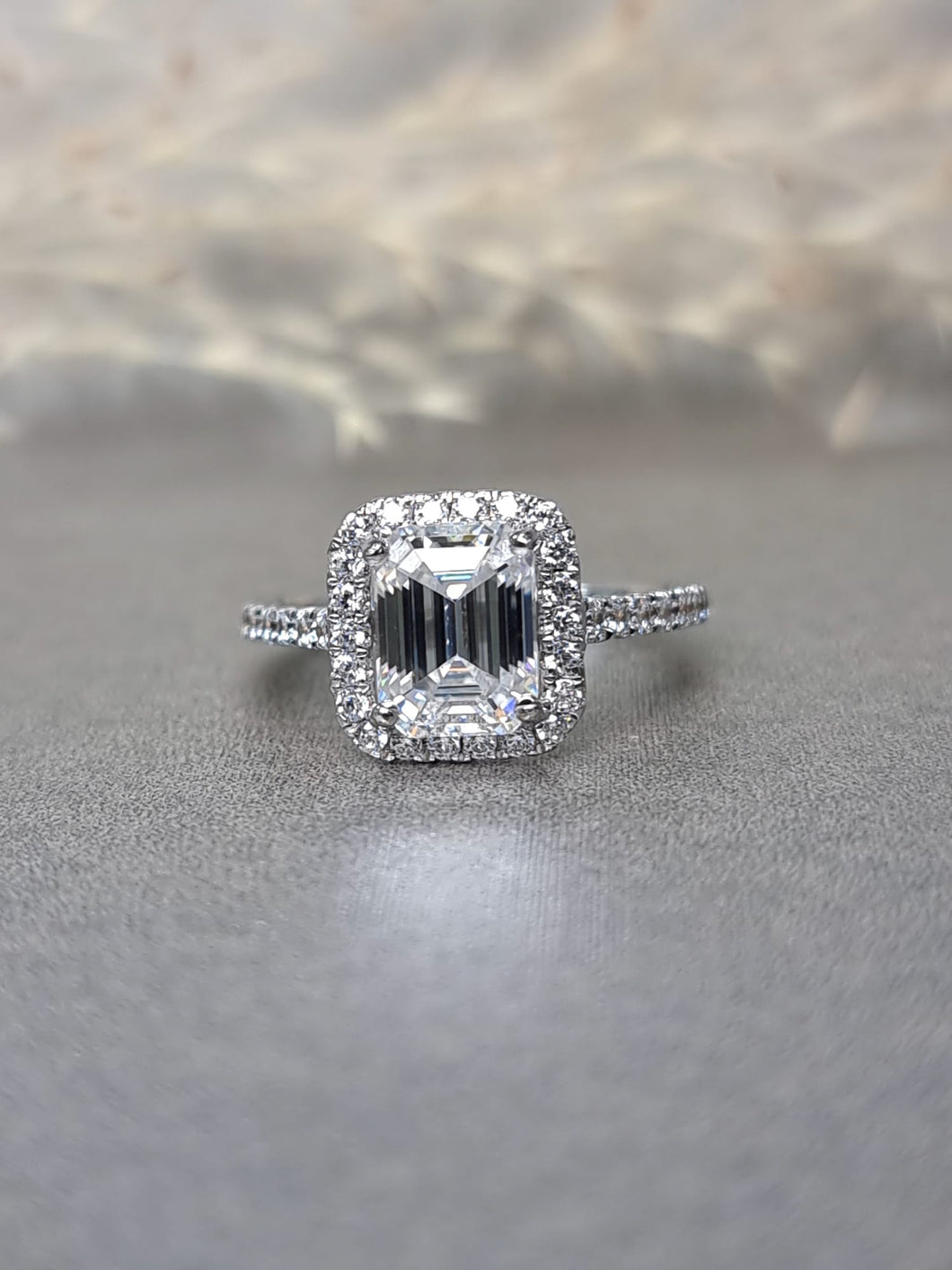 2.00ct Emerald Cut Moissanite Diamond With Side Stone Halo Ring