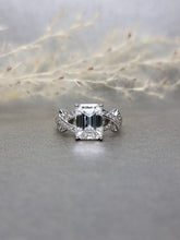Load image into Gallery viewer, 3.00ct Emerald Cut Moissanite Diamond With Criss-cross Ring
